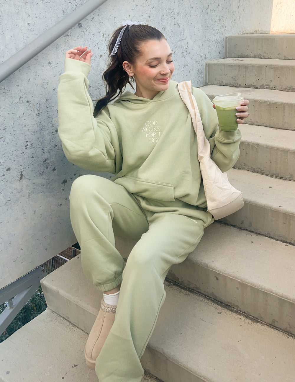 Elevated Faith Christian Hoodie in soft green color, paired with matching pants, perfect for casual wear