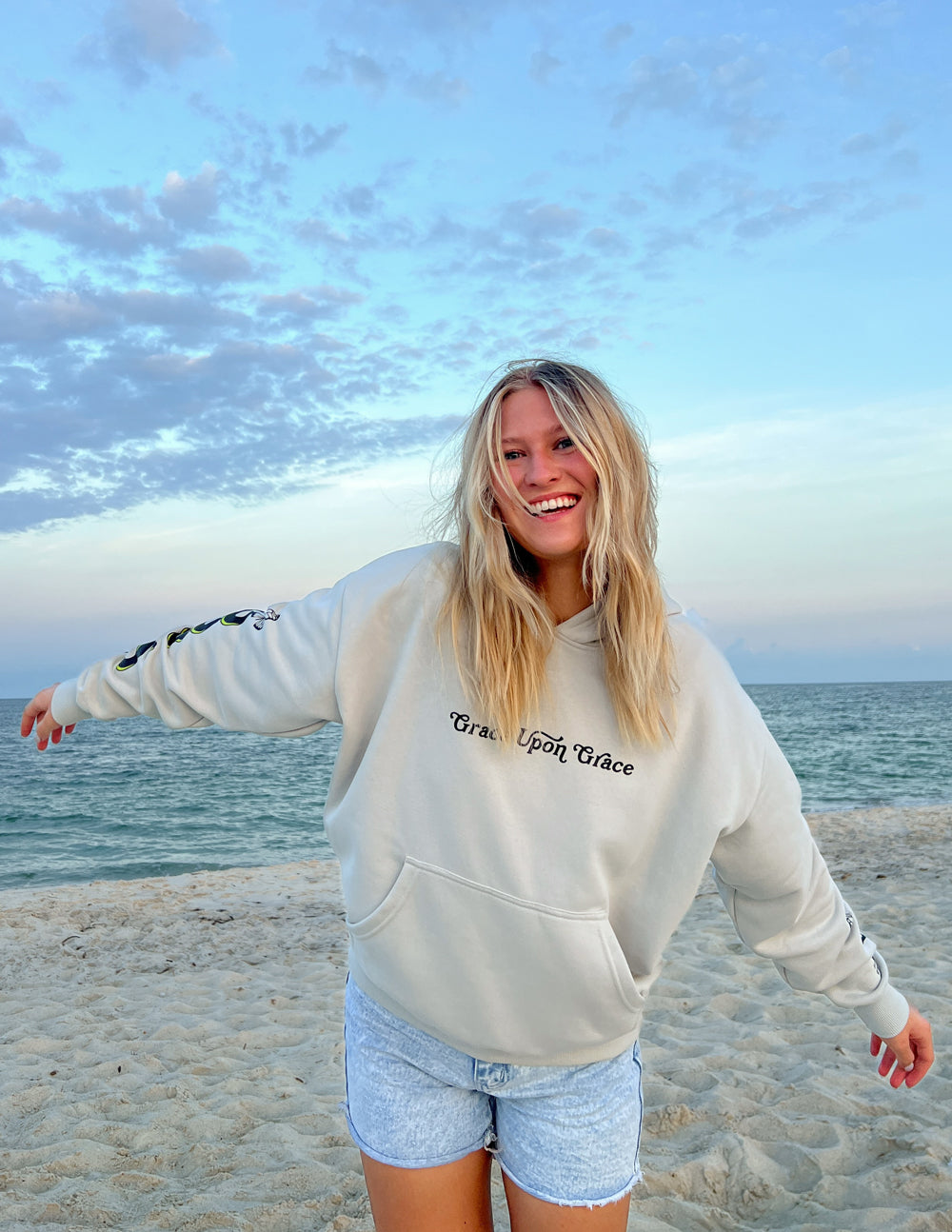 Elevated Faith Christian Hoodie with 'Grace Upon Grace' design for casual beach wear