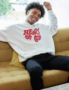 Elevated Faith Christian Hoodie featuring a bold 'Heart of God' graphic on a cozy white design