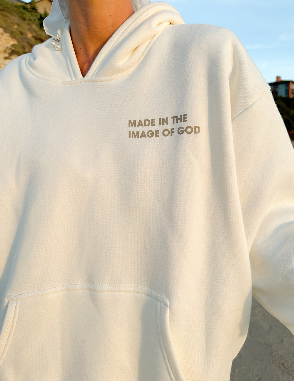 Elevated Faith Christian Hoodie in white with 'Made in the Image of God' text on front
