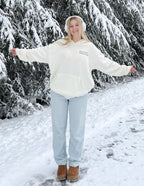Elevated Faith Christian Hoodie in cream color, perfect for winter wear in snowy settings