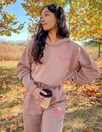 Elevated Faith Christian Hoodie in soft brown fabric with a relaxed fit, styled for outdoor comfort