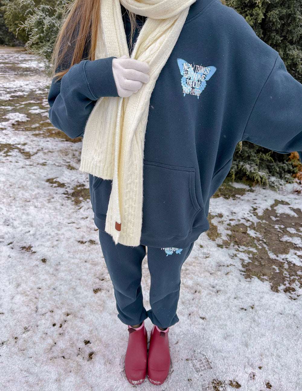 Elevated Faith Christian Hoodie in dark color, paired with a cozy scarf, ideal for winter style