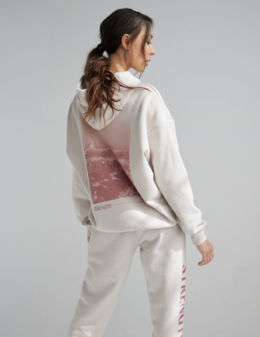 Elevated Faith Christian Hoodie in Cream with Inspirational Strength Graphic on Back