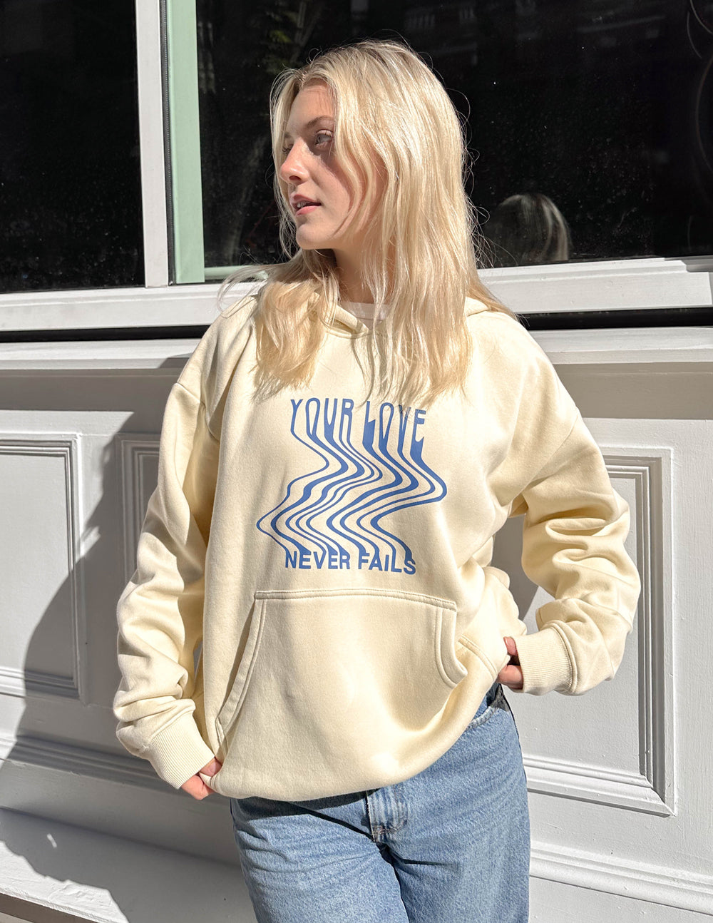 Elevated Faith Christian Hoodie in Cream with 'Your Love Never Fails' Graphic Design