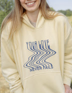 Elevated Faith Christian Hoodie in Soft Yellow with 'Your Love Never Fails' Design