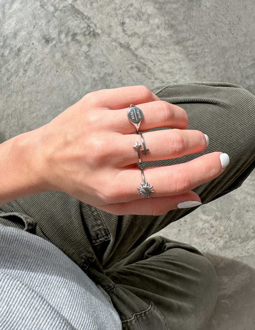 Elegant silver stackable rings highlighting faith symbols, perfect for Christian Jewelry lovers