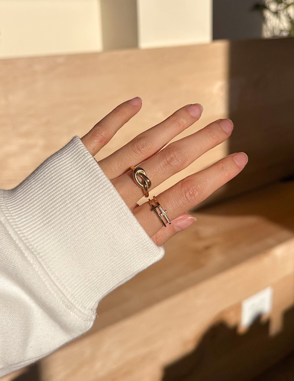 Gold Elevate Faith Christian Jewelry Ring on a Stylish Hand, Perfect for Everyday Wear