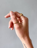 Elevated Faith Christian Jewelry Ring in Gold on a Hand with Elegant Design