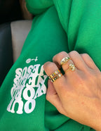 Elevated Faith Christian Jewelry Rings on Hand with Colorful and Elegant Designs
