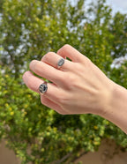 Elevated Faith ring showcased on a hand, featuring Christian Jewelry design with meaningful symbols