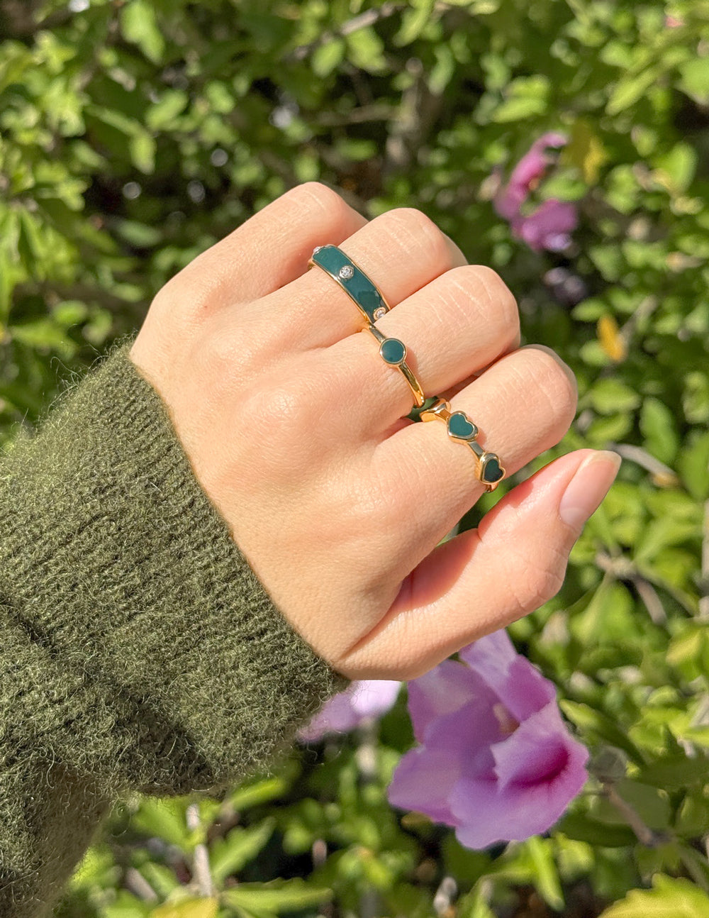 Gold Elevated Faith Ring Set with Green Stones for Christian Jewelry Lovers