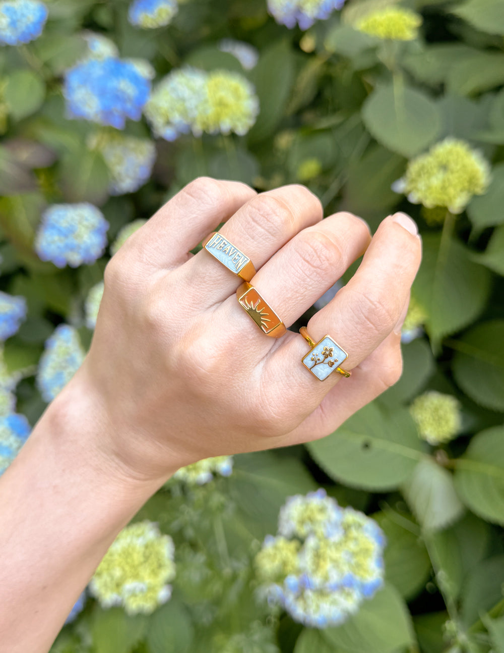 Set of Elevated Faith Christian Jewelry rings featuring faith-inspired designs and vibrant colors