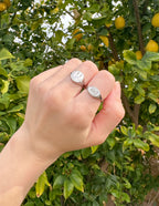 Elevated Faith Christian Jewelry Ring in Silver with Engraved Design on Hand Among Greenery