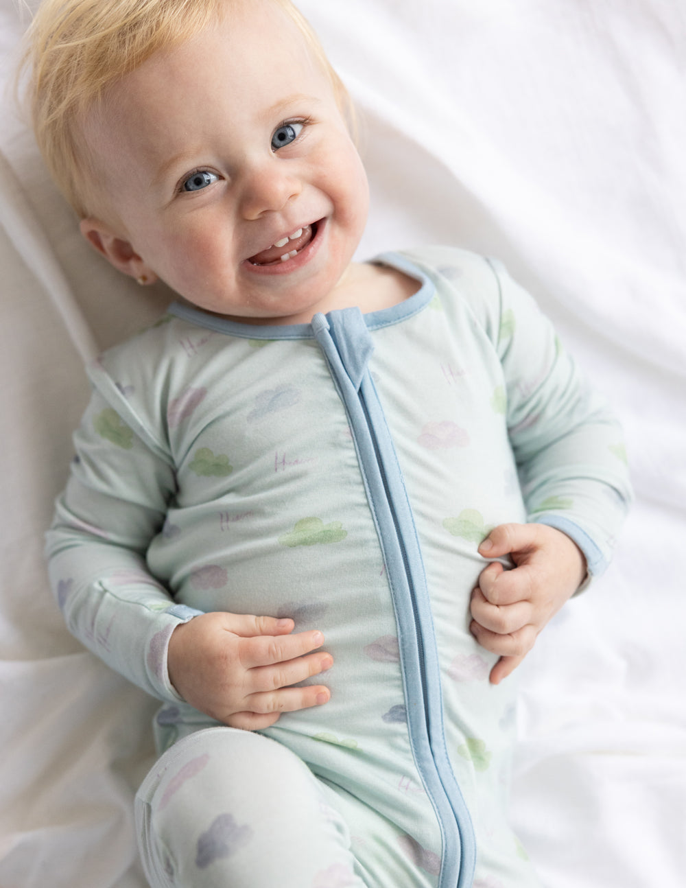 Elevated Faith Christian Kids Apparel Onesie in Light Green with Playful Cloud Print for Babies