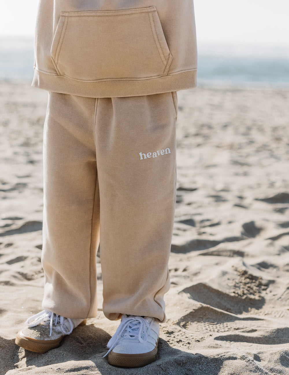 Beige kids sweatpants from Elevated Faith with 'heaven' embroidery, perfect for Christian Kids Apparel