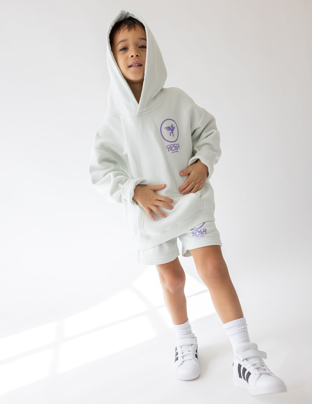 Light green Elevated Faith Kids Hoodie featuring a playful design for Christian Kids Apparel