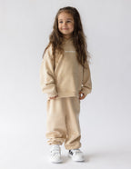 Elevated Faith Kids Hoodie in Beige with Front Pocket, part of Christian Kids Apparel collection
