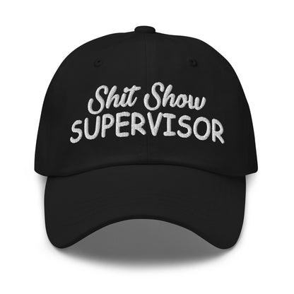 Black dad hat with white embroidered 'Shit Show SUPERvISOR' logo