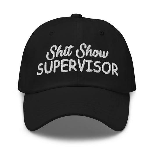 Black dad hat with white embroidered 'Shit Show SUPERvISOR' logo
