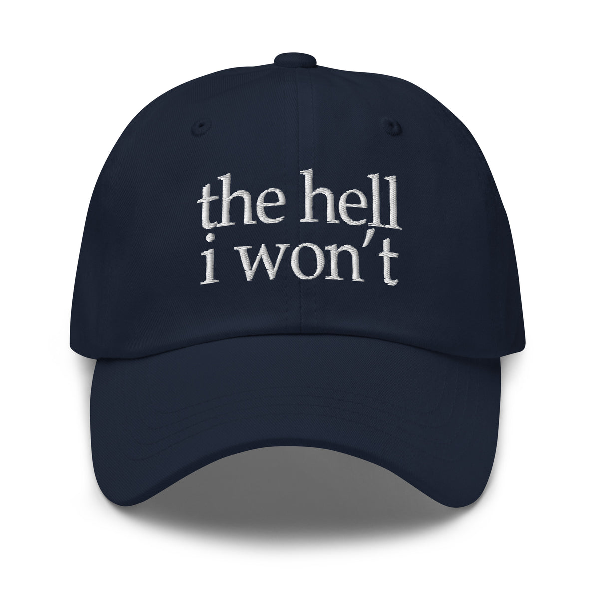 Navy embroidered dad hat with white 'the hell i won't' front text