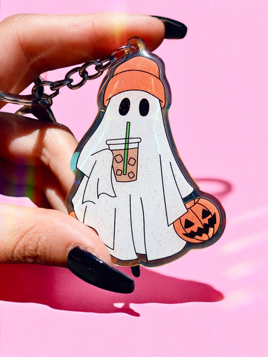 Funny Iridescent ghost keychain with orange cap, holding a Halloween coffee cup charm