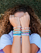 Colorful Elevated Faith Christian Jewelry Bracelet stacked on wrists for a stylish look
