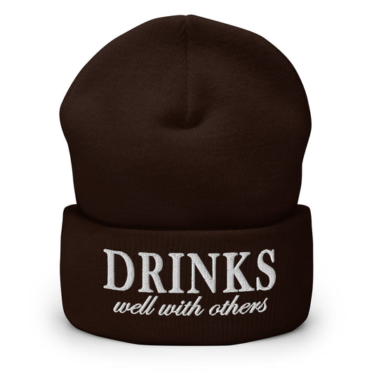 Brown knit cuffed beanie with embroidered 'DRINKS' and 'well with others'