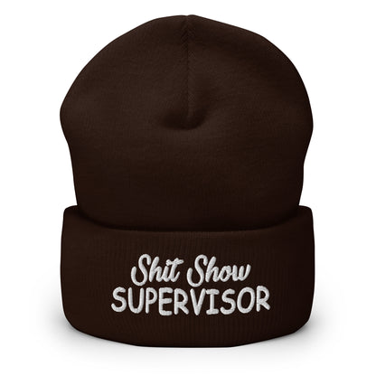 Brown knitted beanie with folded cuff and embroidered “Shit Show SUPERVISOR” logo