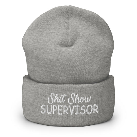 Heather grey knitted beanie with folded cuff and embroidered “Shit Show SUPERVISOR” logo