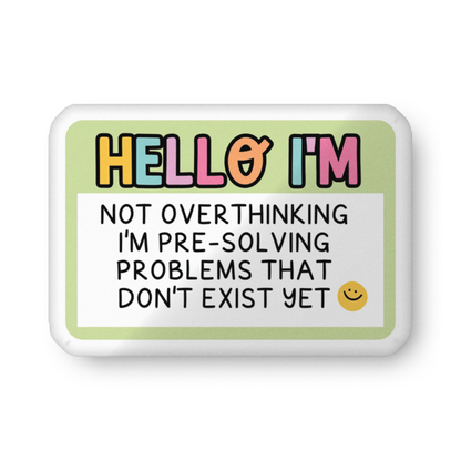 Custom-shaped light gray pillow with green panel text: "Hello I'm pre-solving"