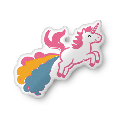 Unicorn-shaped pillow with pink-and-white unicorn on rainbow mane