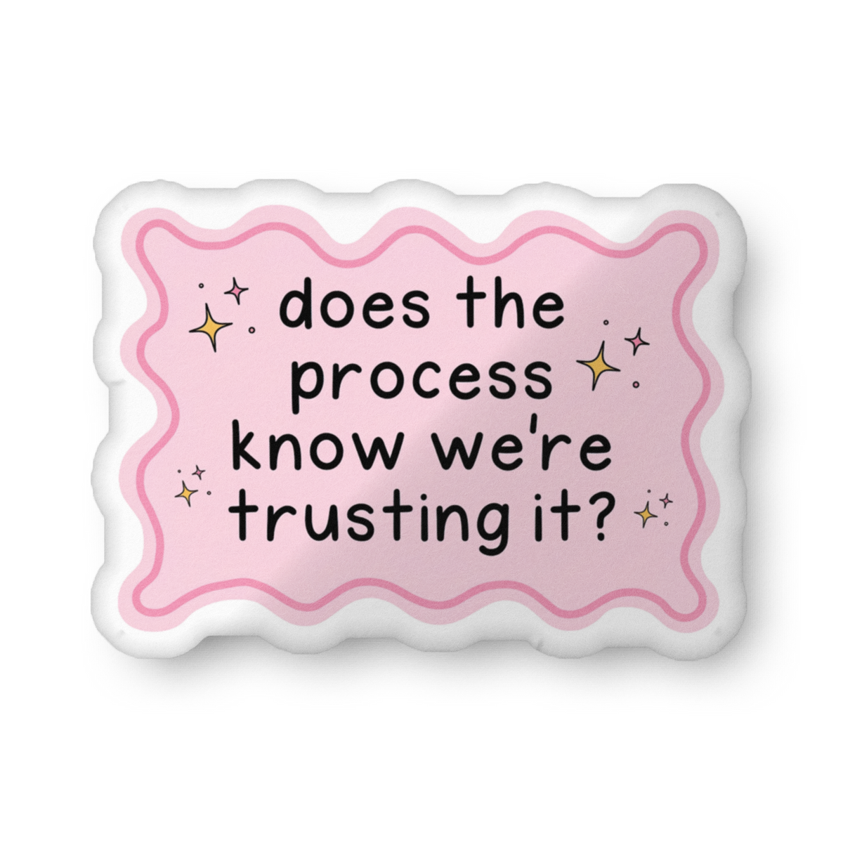 Custom-shaped pillow with pink wavy border and text: does the process know we're trusting?