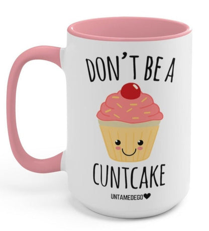 Funny "Don't Be A CuntCake" — White mug with pink handle, cupcake graphic, and 'DON'T BE A CUNTCAKE'