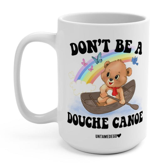 Funny "Don't Be A Douche Canoe Lolly The Bear" — White 15oz ceramic mug with cartoon bear in canoe and bold humorous text, rainbow graphic