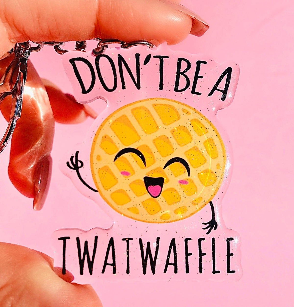 Funny Waffle acrylic keychain with smiling waffle face and “Don’t Be A T, I Waitwaffle” text