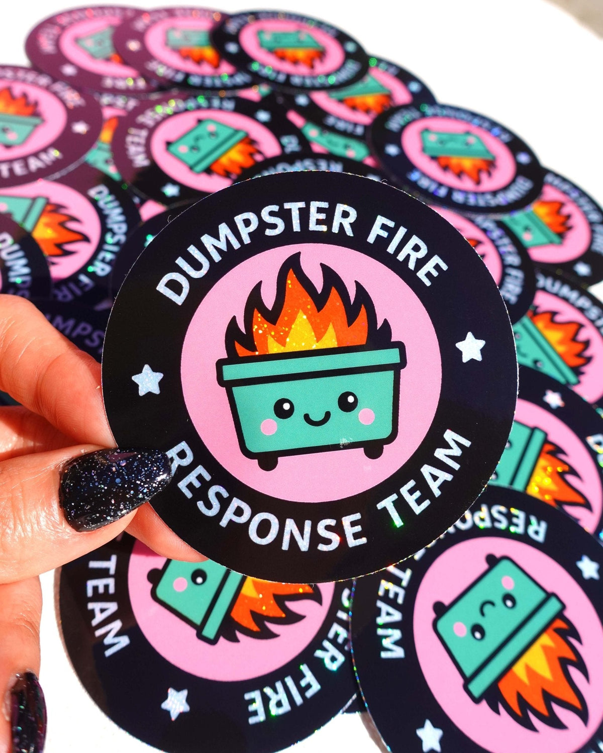 Funny Round black sticker featuring pink badge, smiling green fire pot, and “RESPONSE TEAM” text