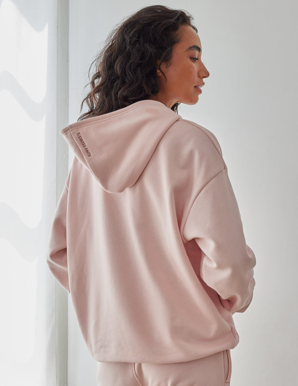Soft Pink Elevated Faith Christian Hoodie Featuring a Cozy Fit and Relaxed Style