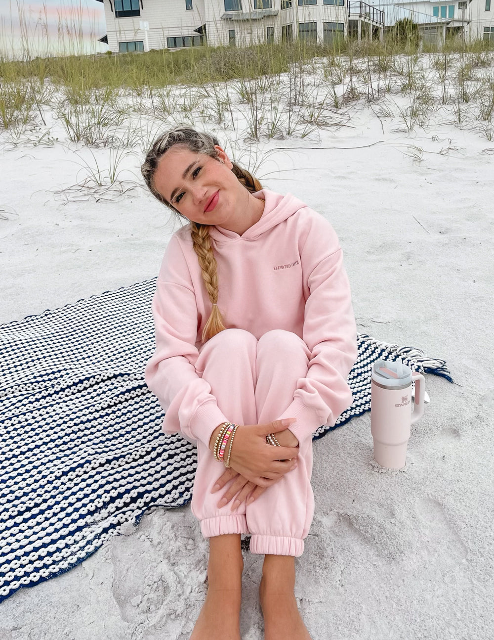 Light pink Christian Hoodie from Elevated Faith, perfect for casual beach outings