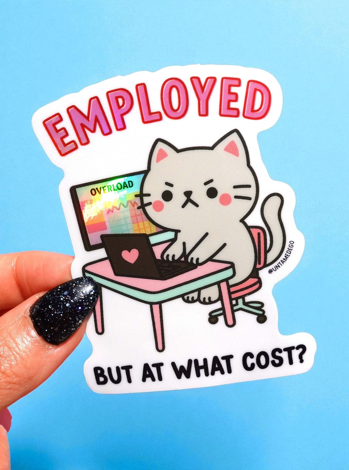 Funny Angry kitty at desk sticker with “EMPLOYED” and “BUT AT WHAT COST?” text