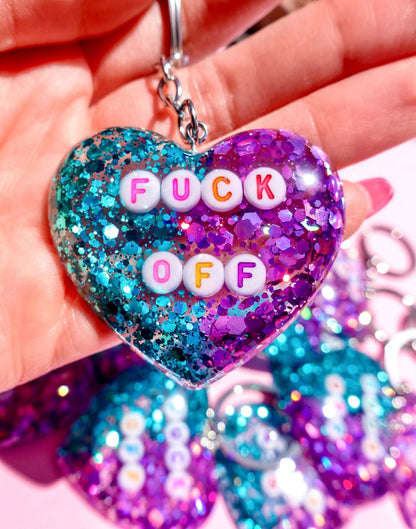 Funny Glitter heart keychain with metal chain, blue-purple sparkle and “FUCK OFF” text
