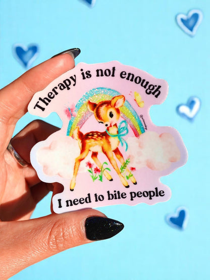 Funny Therapy-themed deer sticker with rainbow glitter and text “I need to bite people”