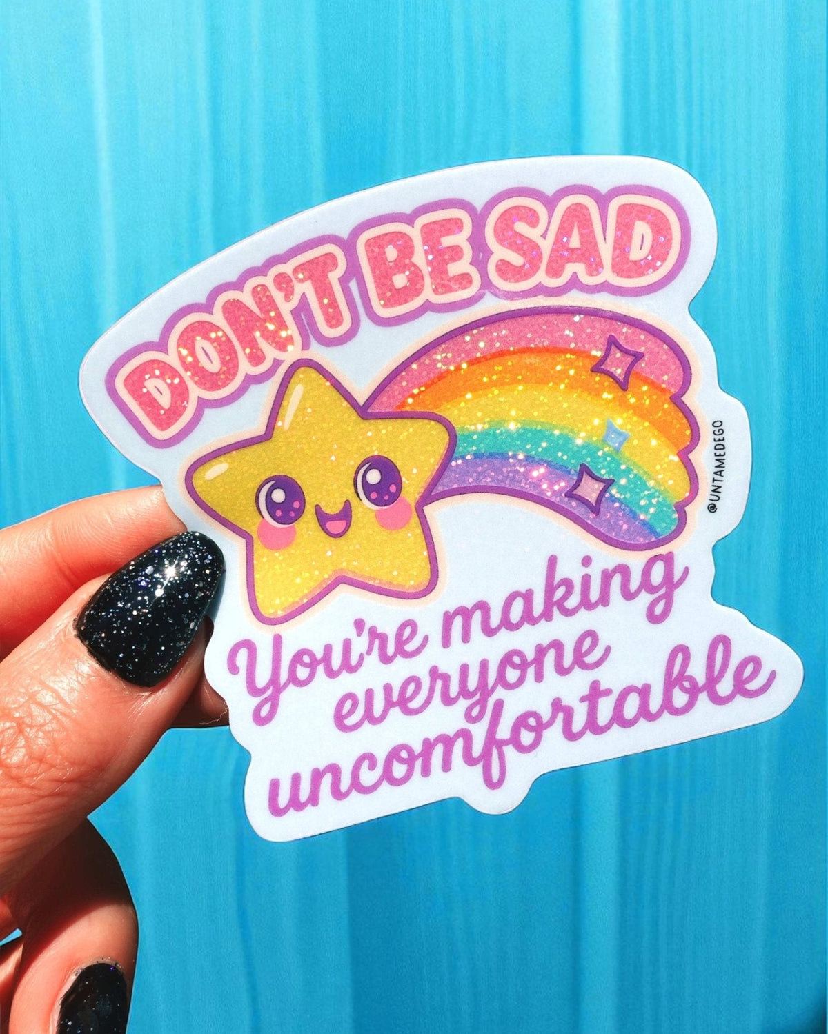 Funny Kawaii rainbow cat sticker with text “DON'T BE SAD” and “You're making everyone uncomfortable”