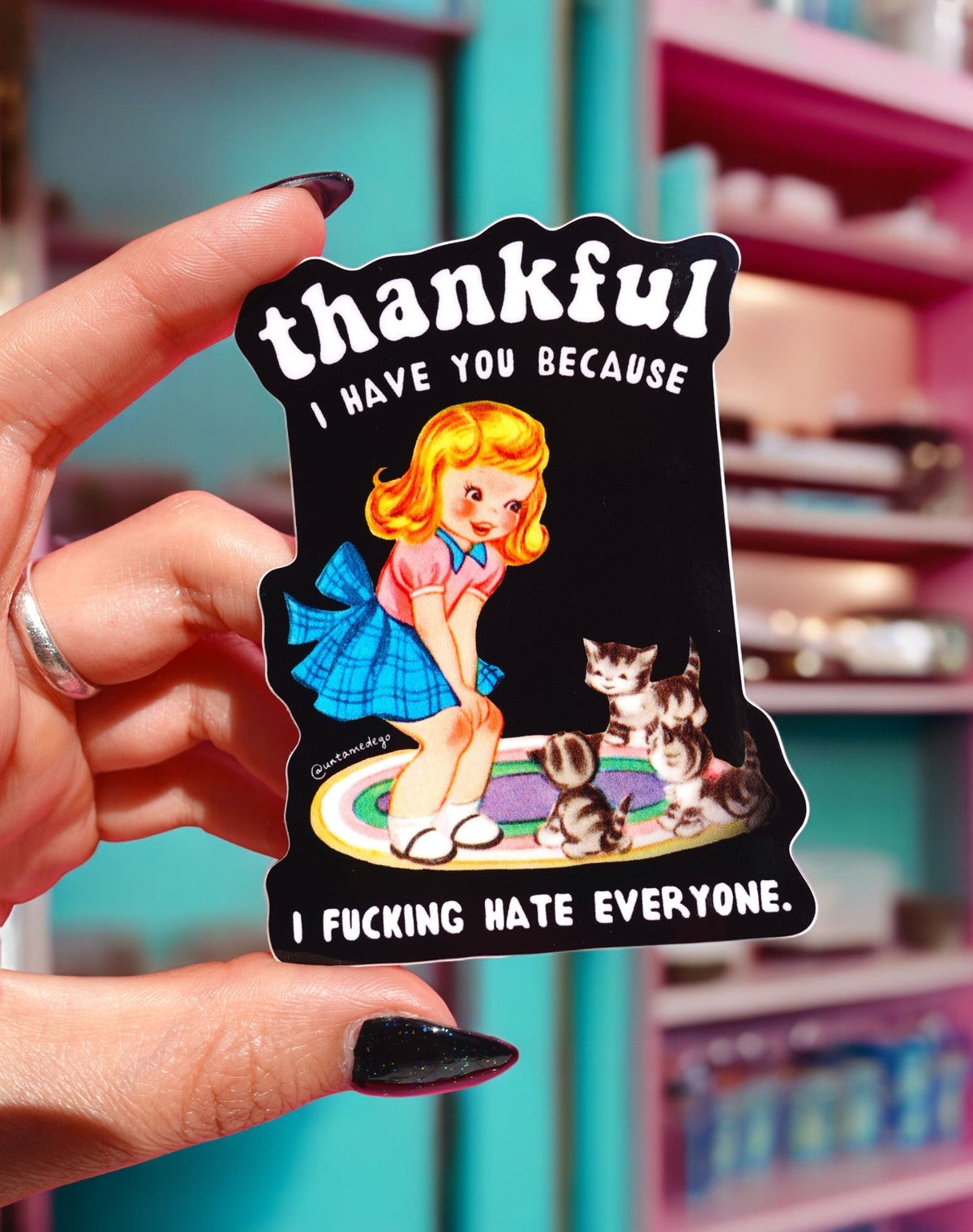 Funny Thankful cat sticker held in hand, black with red-haired woman, cats, rainbow, and 'I have you because'