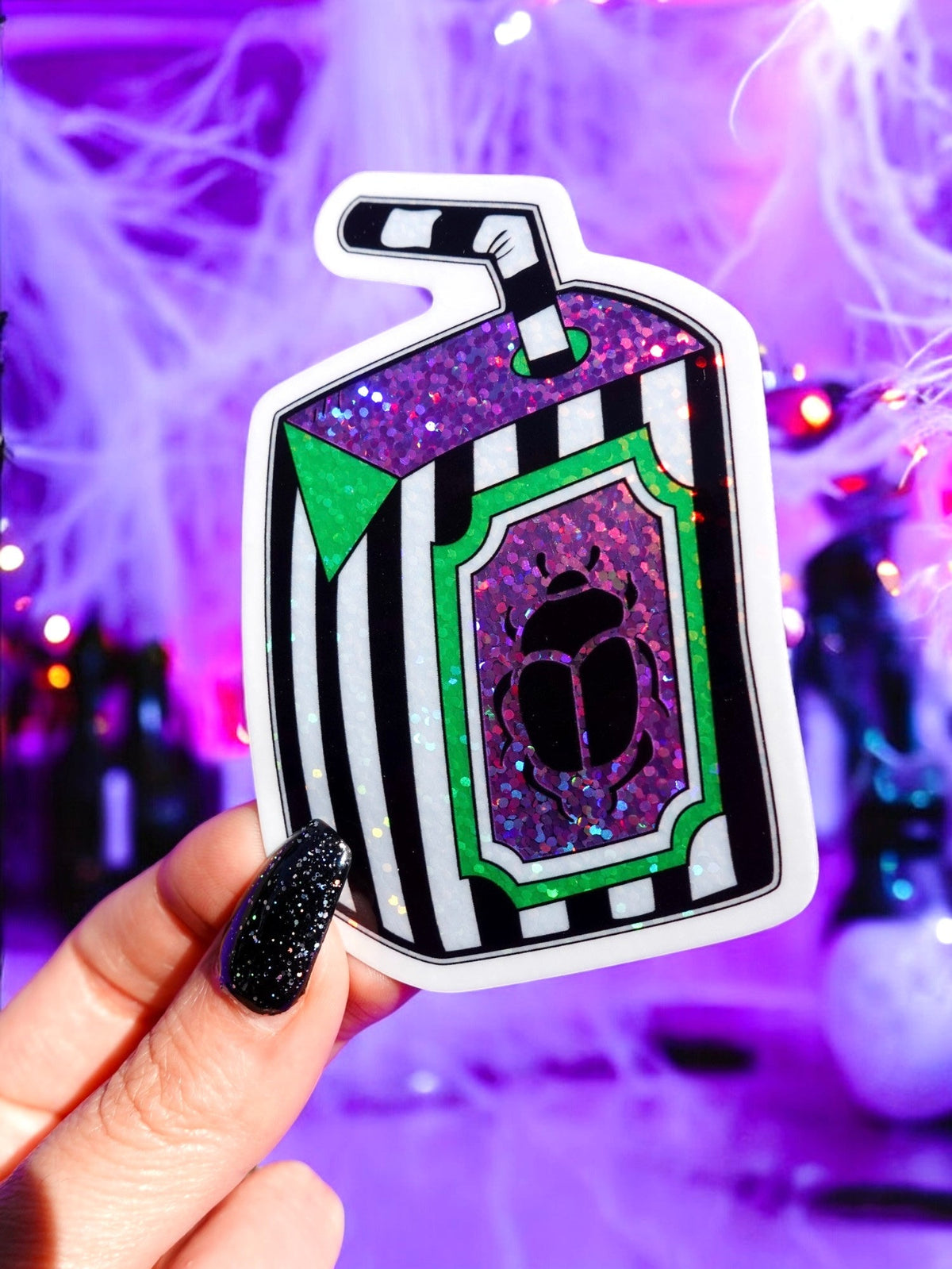 Funny Vinyl bottle-shaped sticker with green and purple glitter, black outline, glossy finish