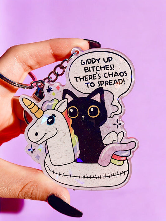 Funny Holographic round keychain with cat and unicorn graphic and quote, attached keyring.