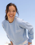Light blue Christian Crewneck Sweatshirt with 'Growing with God' text for comfort and faith.