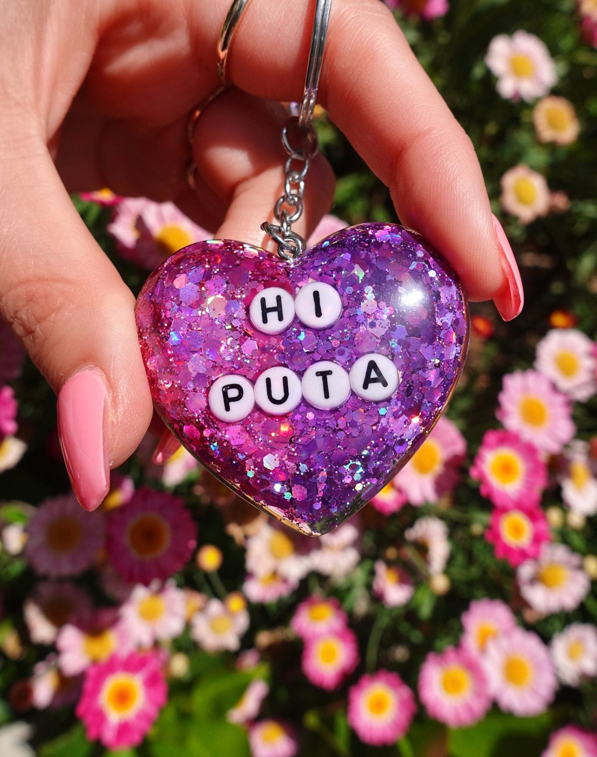 Funny Purple glitter heart keychain with metal ring and letters “HI PUTA”