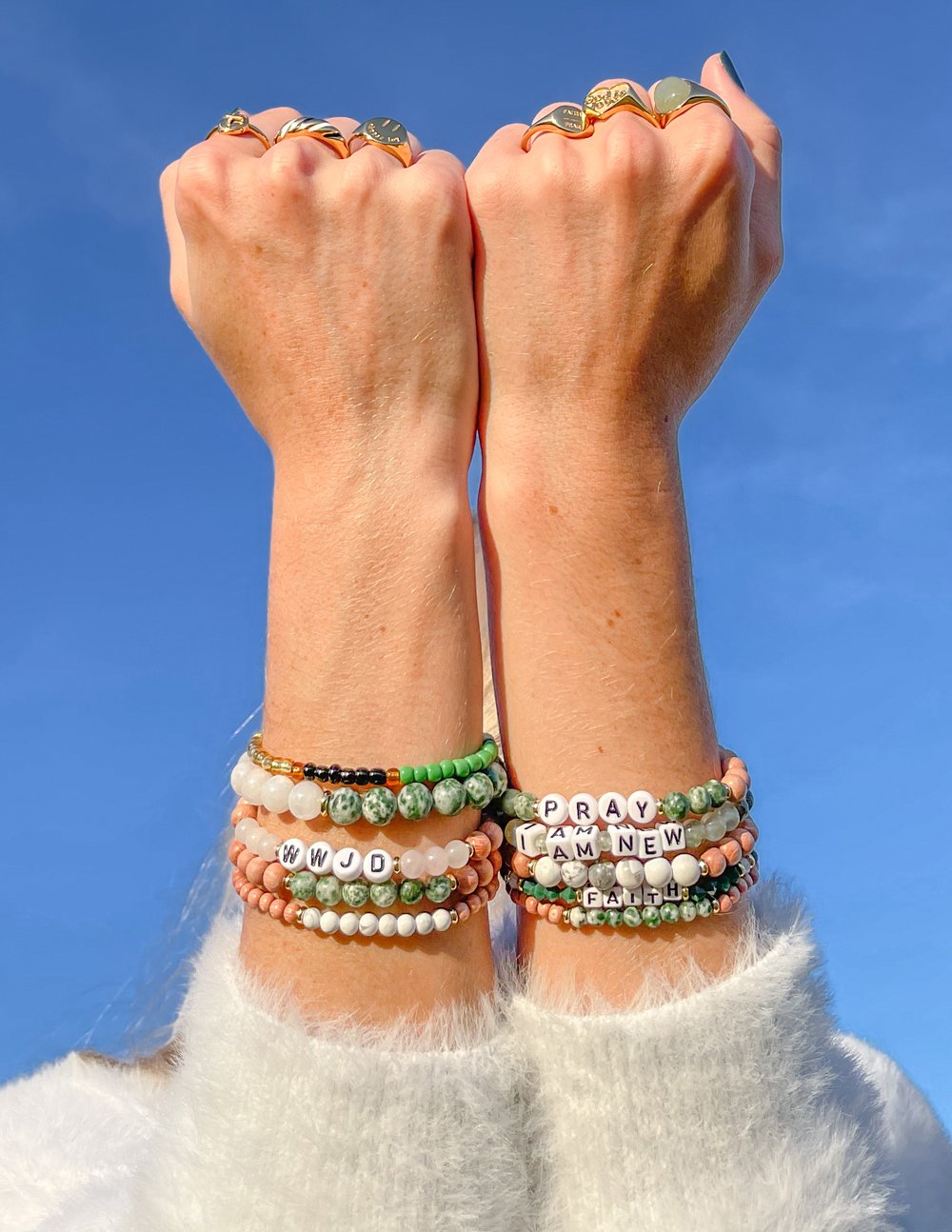 Stack of Elevated Faith Christian Jewelry Bracelets with colorful stones and inspirational beads