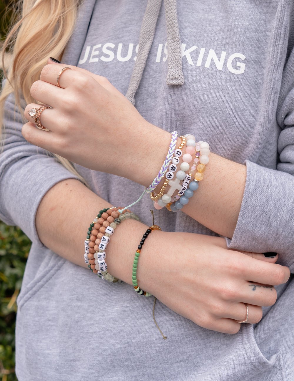 Assorted Letter Bracelet Stack showcasing Christian Jewelry Bracelet on a casual outfit